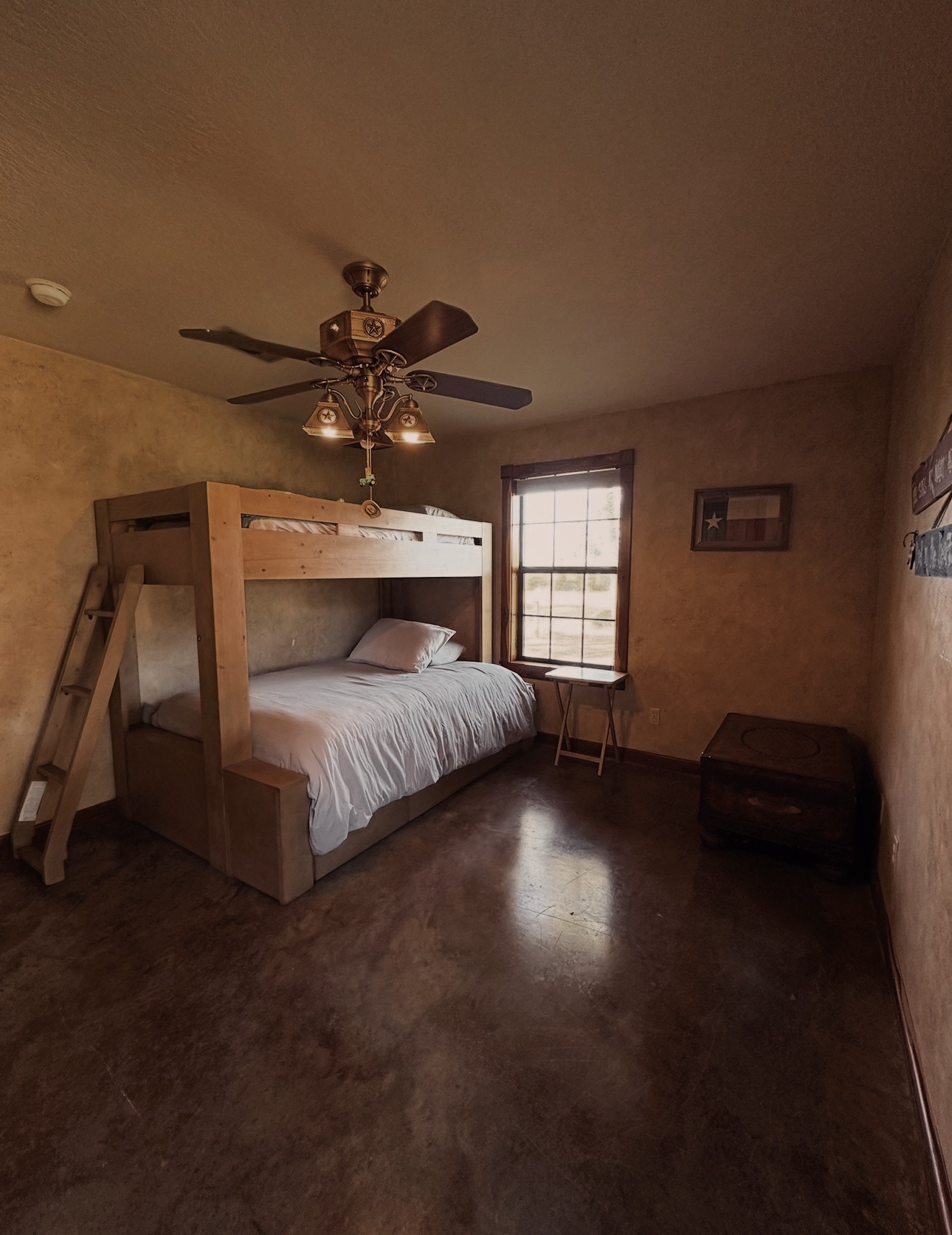 Tidy bedroom with bunk bed, made and dusted